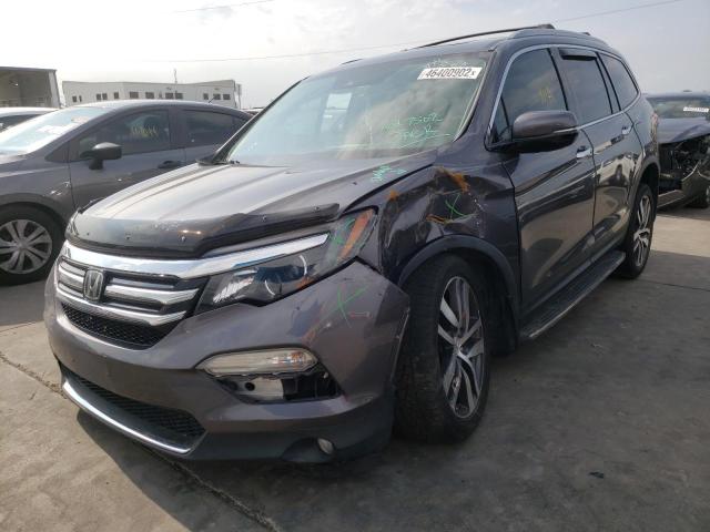 Photo 2 from auction – 2016 HONDA PILOT TOUR with VIN 5FNYF6H92GB046724