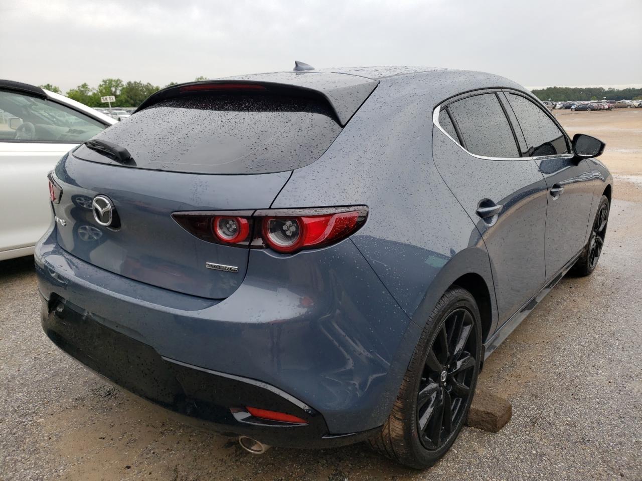 Photo 4 from auction – 2021 MAZDA 3 PREMIUM with VIN JM1BPAML9M1401688