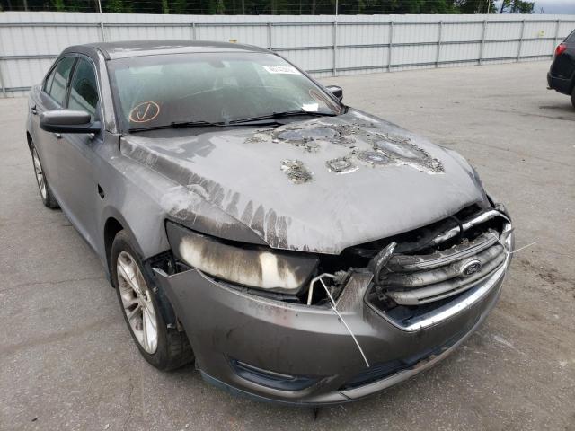 FORD TAURUS SEL 2013 with VIN 1FAHP2E9XDG187428 - Photo from auction