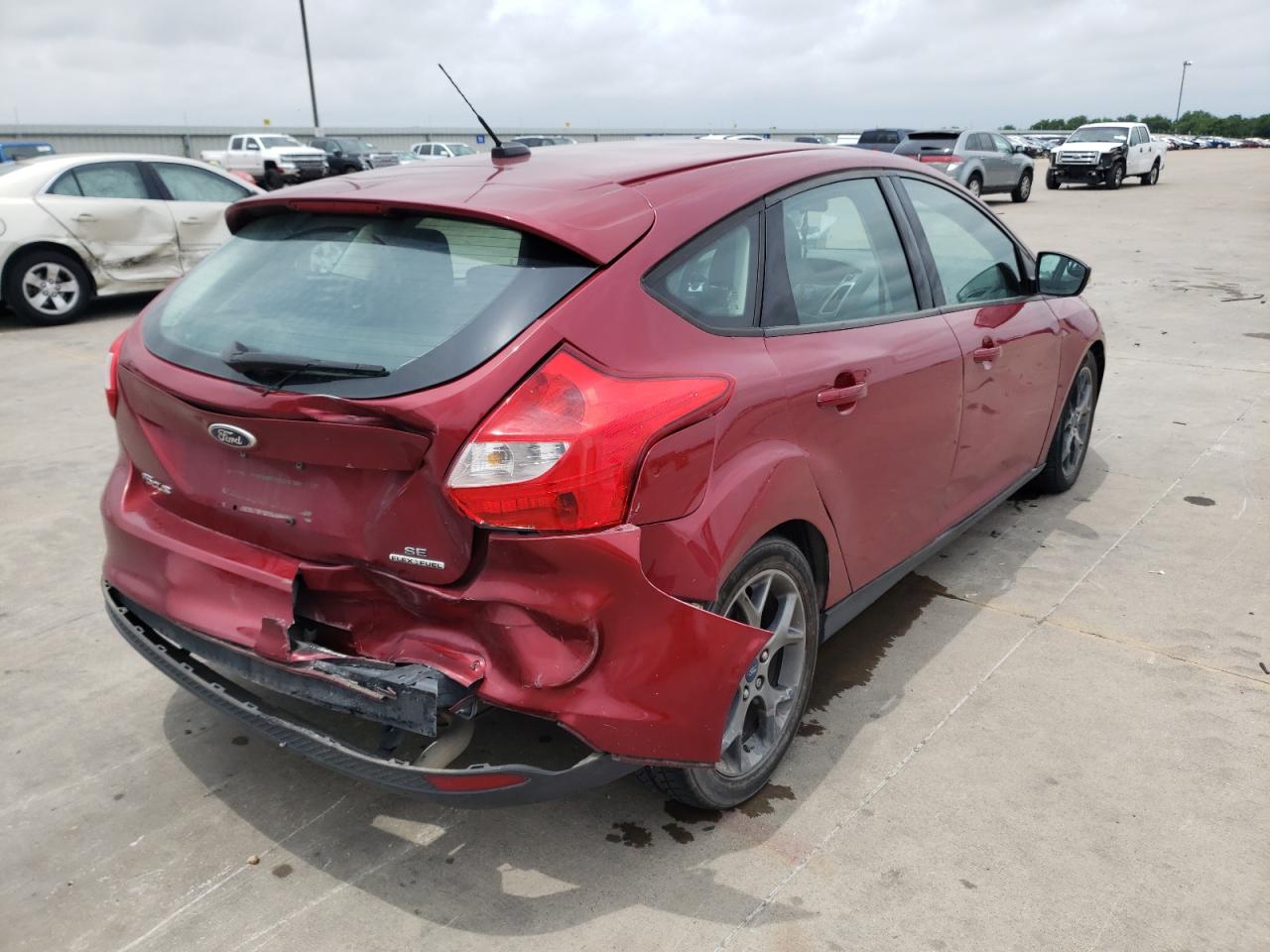 Foto 4 de la subasta – 2014 FORD FOCUS SE con VIN 1FADP3K20EL296534
