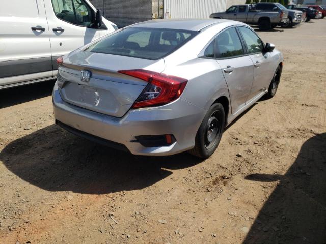 Photo 9 from auction – 2018 HONDA CIVIC LX with VIN 2HGFC2F54JH594350