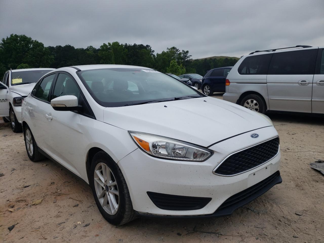 FORD FOCUS SE 2015 with VIN 1FADP3F29FL227546 - Photo from auction