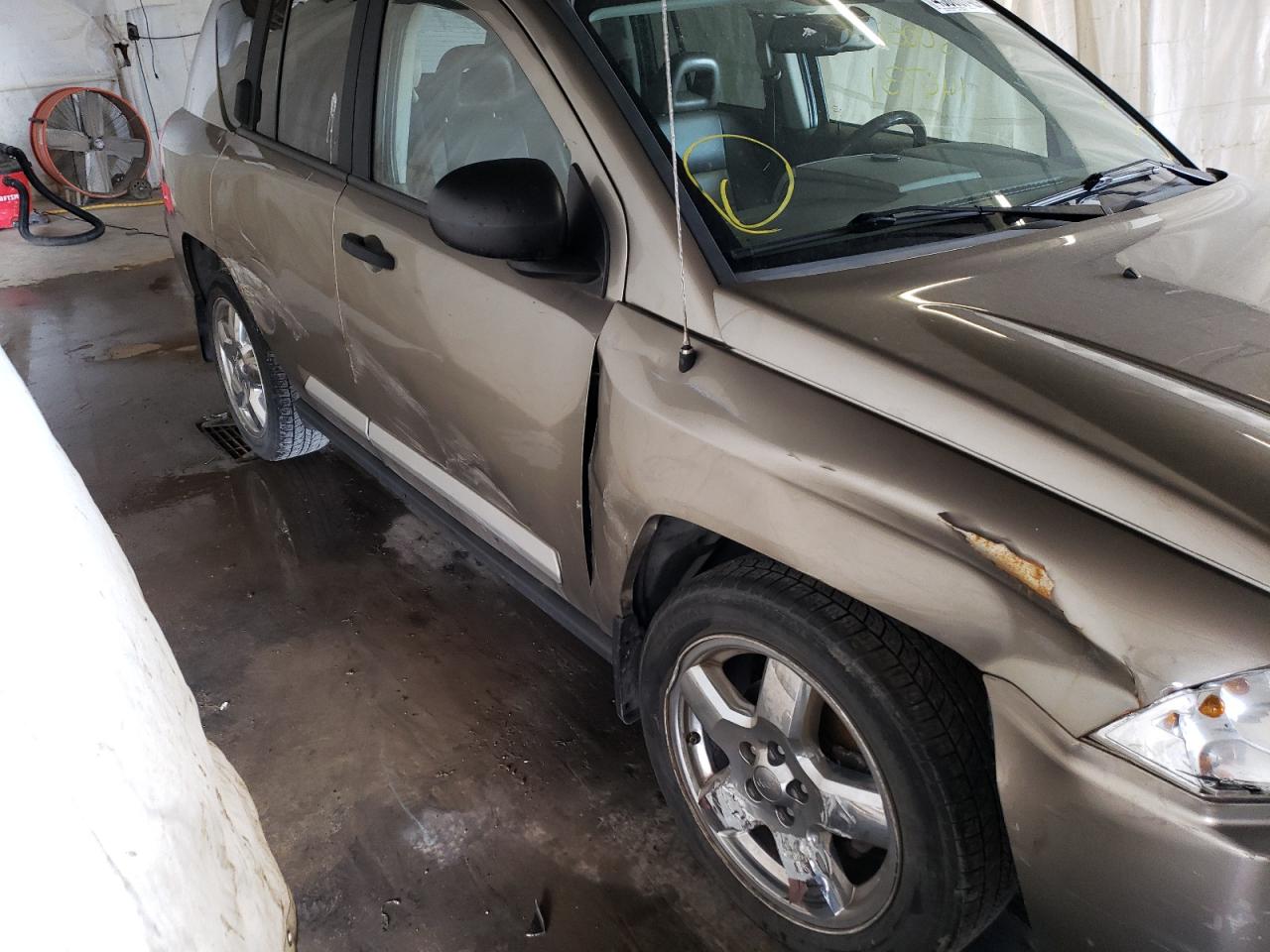 Photo 9 from auction – 2007 JEEP COMPASS LI with VIN 1J8FT57W87D176511