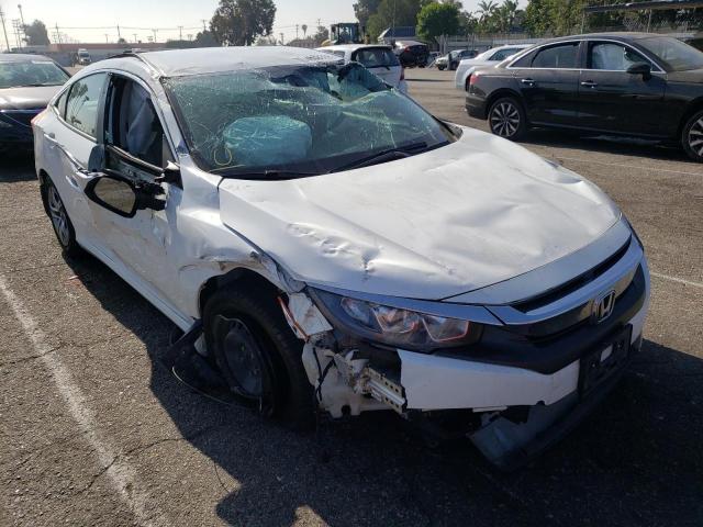 HONDA CIVIC LX 2018 with VIN 2HGFC2F54JH555869 - Photo from auction