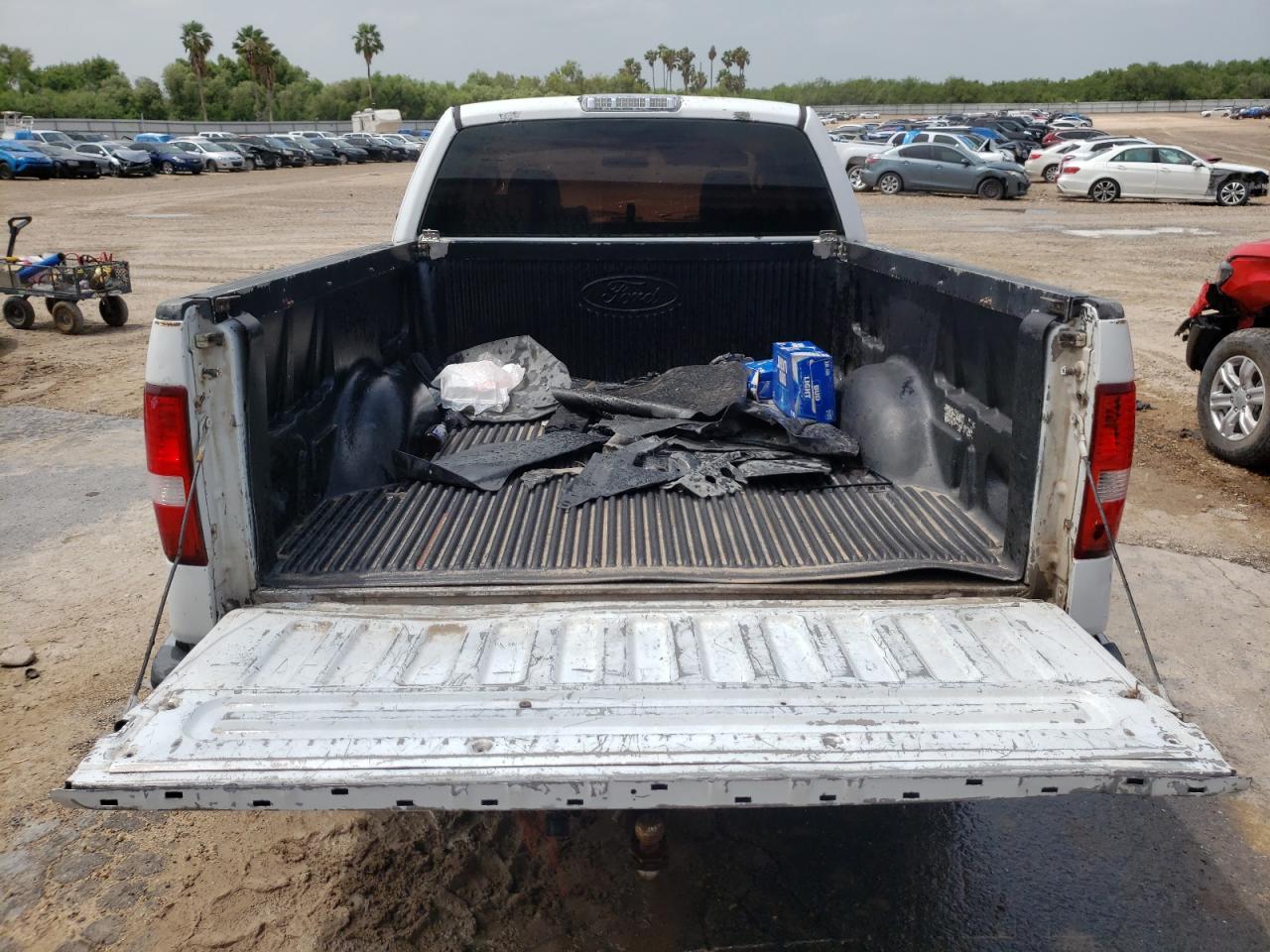 Photo 9 from auction – 2004 FORD F150 with VIN 1FTPX12584NB03197