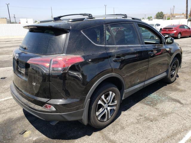 Photo 4 from auction – 2018 TOYOTA RAV4 LE with VIN 2T3ZFREV1JW463213