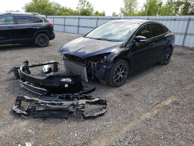 Photo 2 from auction – 2018 FORD FOCUS SE with VIN 1FADP3F21JL317332