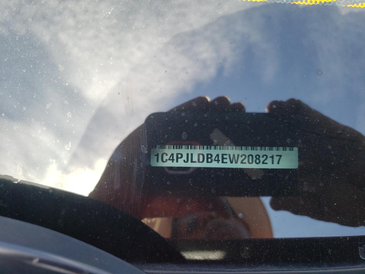 Photo 11 from auction – 2014 JEEP CHEROKEE L with VIN 1C4PJLDB4EW208217