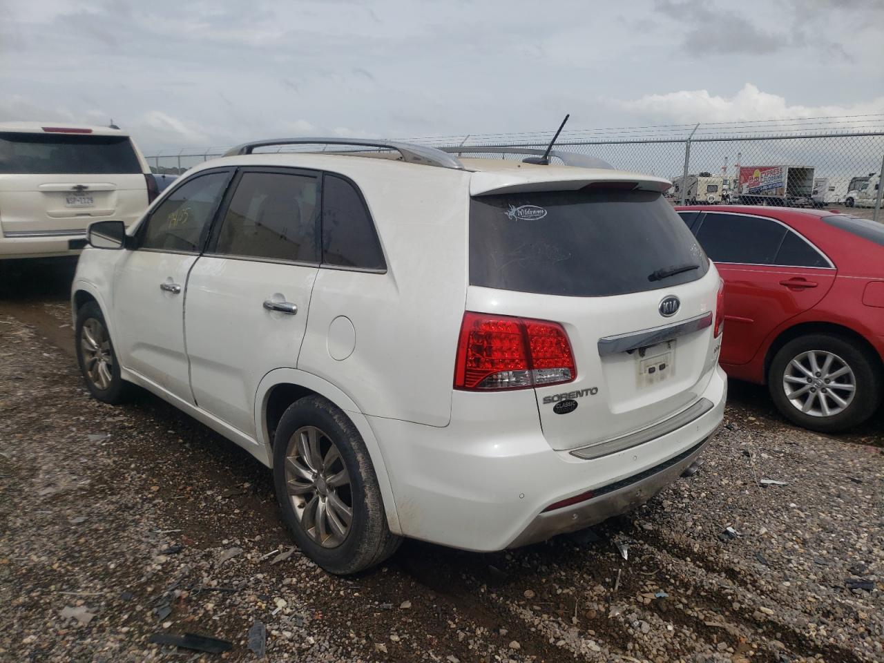 Photo 3 from auction – 2012 KIA SORENTO SX with VIN 5XYKW4A24CG255229
