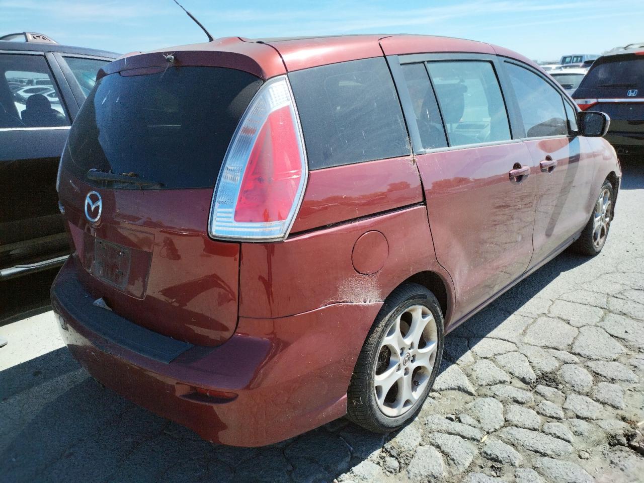 Photo 4 from auction – 2010 MAZDA 5 with VIN JM1CR2W31A0382556