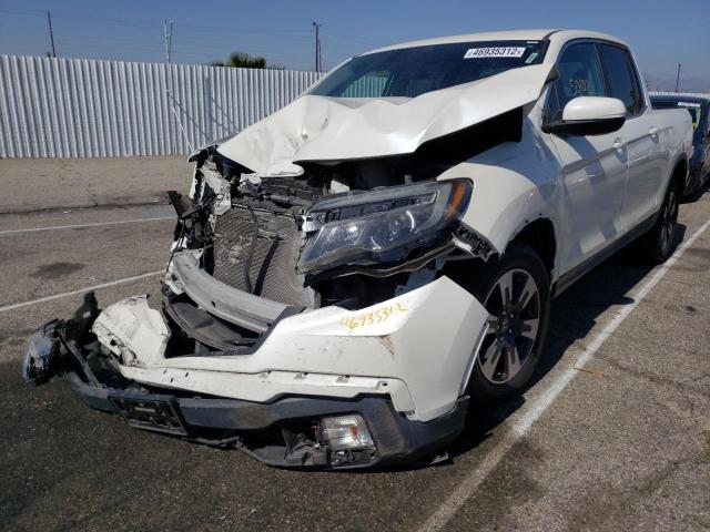 Photo 2 from auction – 2017 HONDA RIDGELINE with VIN 5FPYK2F68HB004693