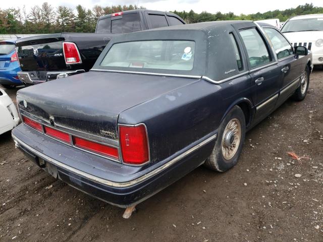 Photo 4 from auction – 1997 LINCOLN TOWN CAR E with VIN 1LNLM81W3VY729956