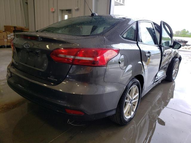 Photo 4 from auction – 2016 FORD FOCUS SE with VIN 1FADP3F21GL216493