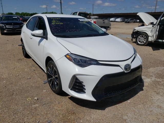 TOYOTA COROLLA L 2018 with VIN 5YFBURHE1JP853242 - Photo from auction