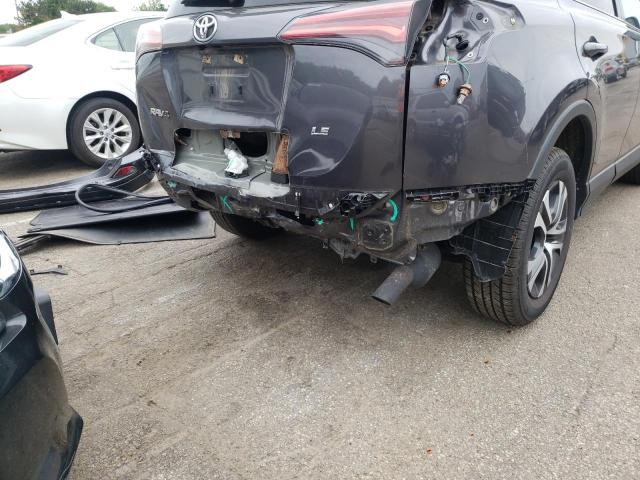 Photo 9 from auction – 2016 TOYOTA RAV4 LE with VIN JTMZFREV9GJ097671