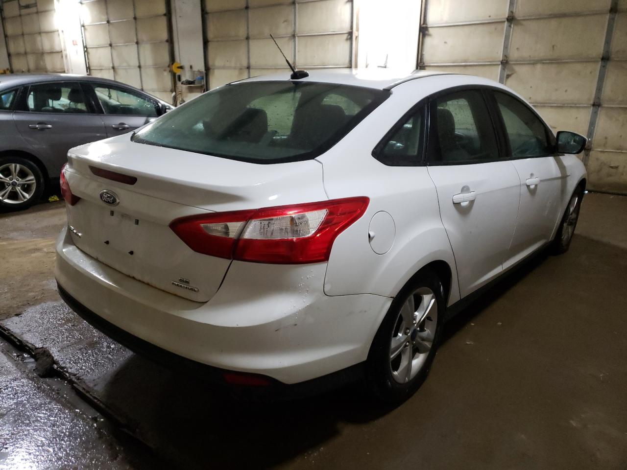 Photo 4 from auction – 2014 FORD FOCUS SE with VIN 1FADP3F2XEL282571