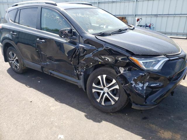 Photo 9 from auction – 2018 TOYOTA RAV4 LE with VIN 2T3BFREV7JW805099