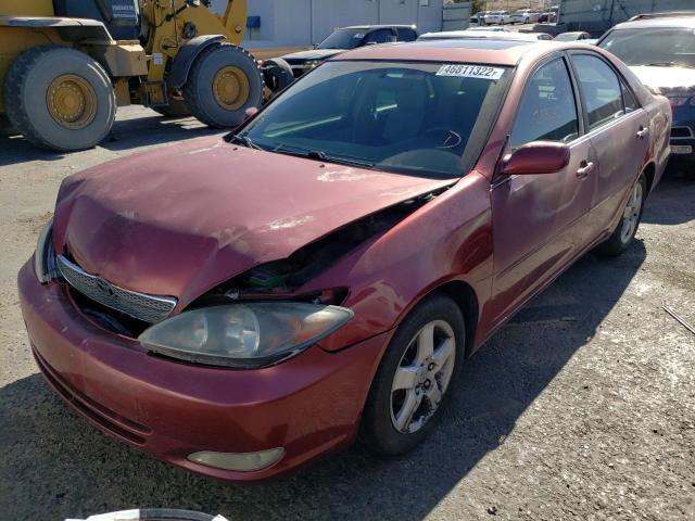 Photo 2 from auction – 2002 TOYOTA CAMRY LE with VIN JTDBE30K220126750