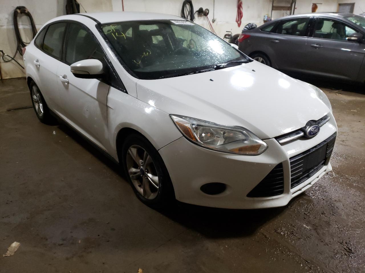 FORD FOCUS SE 2014 with VIN 1FADP3F2XEL282571 - Photo from auction