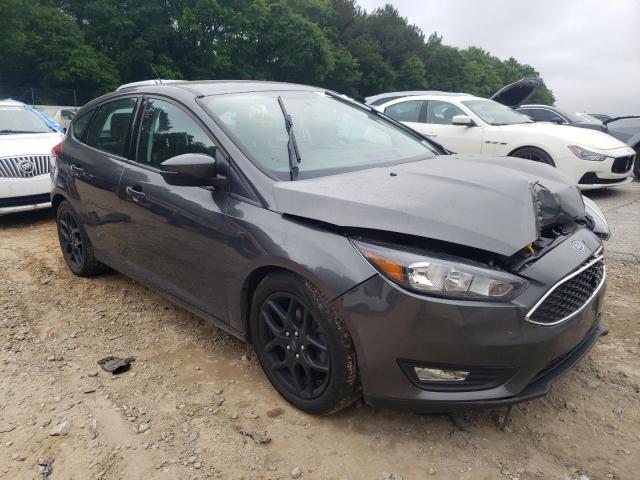 FORD FOCUS SE 2016 with VIN 1FADP3K23GL371715 - Photo from auction