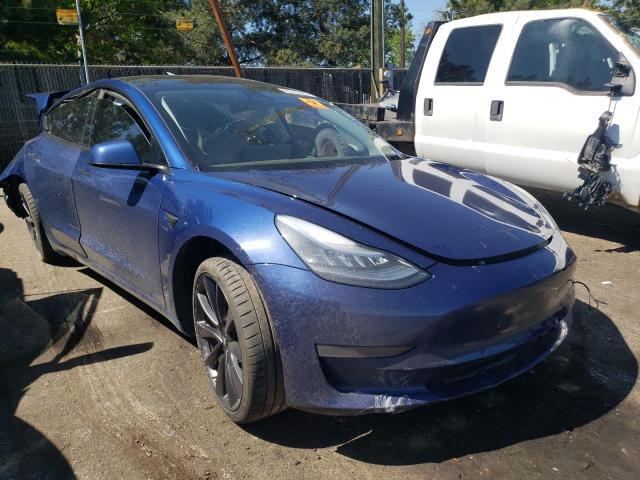 TESLA MODEL 3 2020 with VIN 5YJ3E1EC5LF719404 - Photo from auction