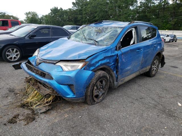 Photo 2 from auction – 2017 TOYOTA RAV4 LE with VIN JTMZFREV8HJ716990