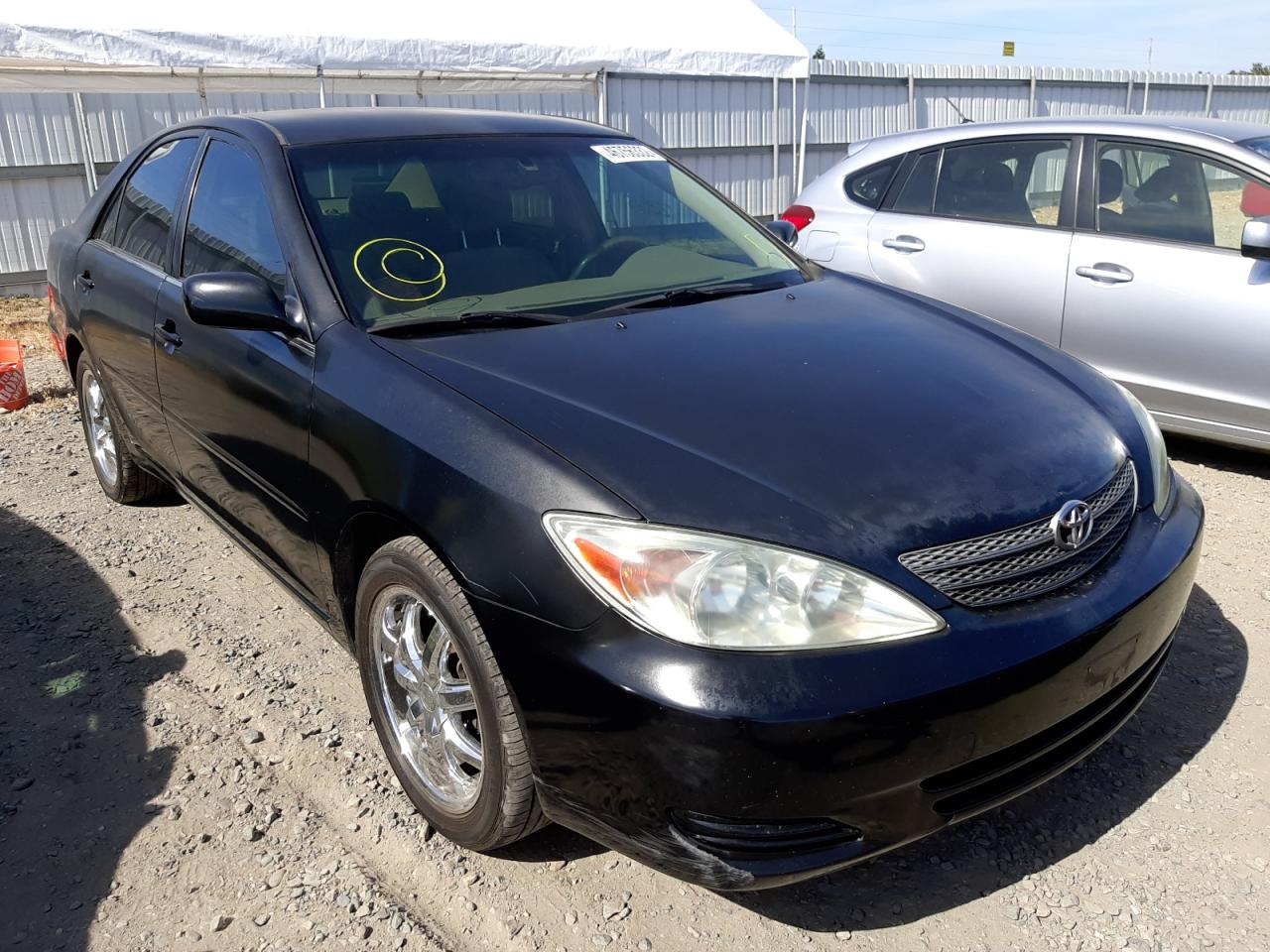 TOYOTA CAMRY LE 2002 with VIN JTDBE32KX20039059 - Photo from auction