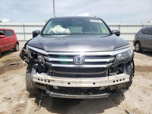 Photo 9 from auction – 2017 HONDA PILOT TOUR with VIN 5FNYF6H91HB084642