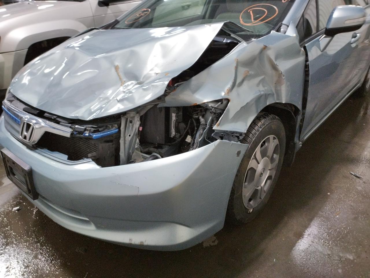 Photo 20 from auction – 2012 HONDA CIVIC HYBR with VIN JHMFB4F35CS007689