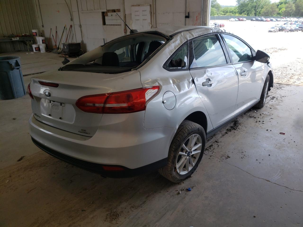 Photo 4 from auction – 2015 FORD FOCUS SE with VIN 1FADP3F22FL297972