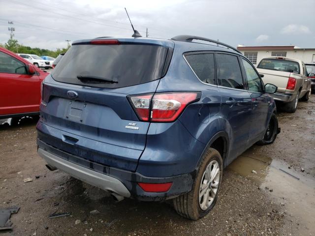 Photo 4 from auction – 2018 FORD ESCAPE SE with VIN 1FMCU0GD3JUC03996