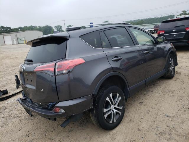 Photo 4 from auction – 2018 TOYOTA RAV4 LE with VIN JTMZFREV4JJ745652