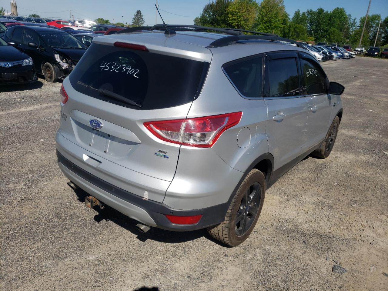 Photo 4 from auction – 2014 FORD ESCAPE SE with VIN 1FMCU9G96EUA24521