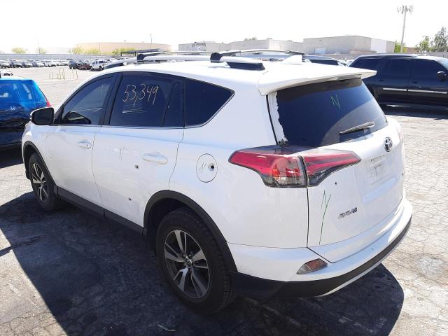 Photo 3 from auction – 2017 TOYOTA RAV4 XLE with VIN JTMWFREV2HD100588