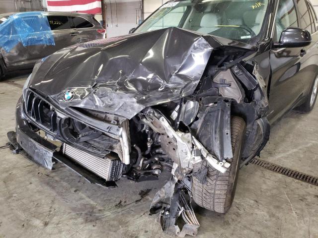 Photo 9 from auction – 2014 BMW X5 XDRIVE3 with VIN 5UXKR0C5XE0K45674