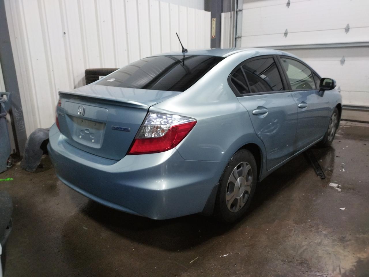 Photo 17 from auction – 2012 HONDA CIVIC HYBR with VIN JHMFB4F35CS007689