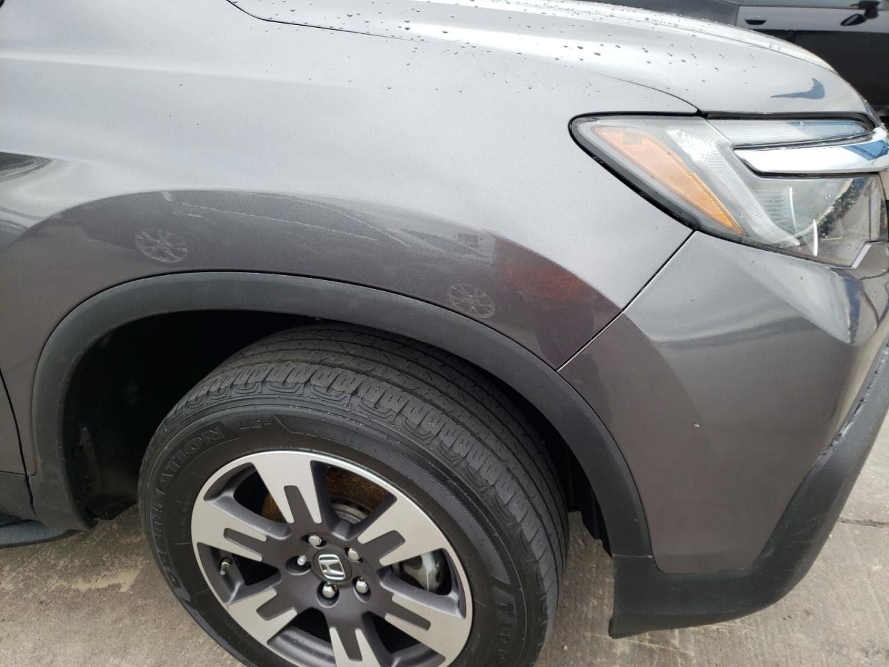 Photo 10 from auction – 2019 HONDA RIDGELINE with VIN 5FPYK3F65KB018953