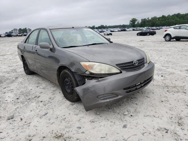 TOYOTA CAMRY LE 2003 with VIN 4T1BE32K03U648831 - Photo from auction