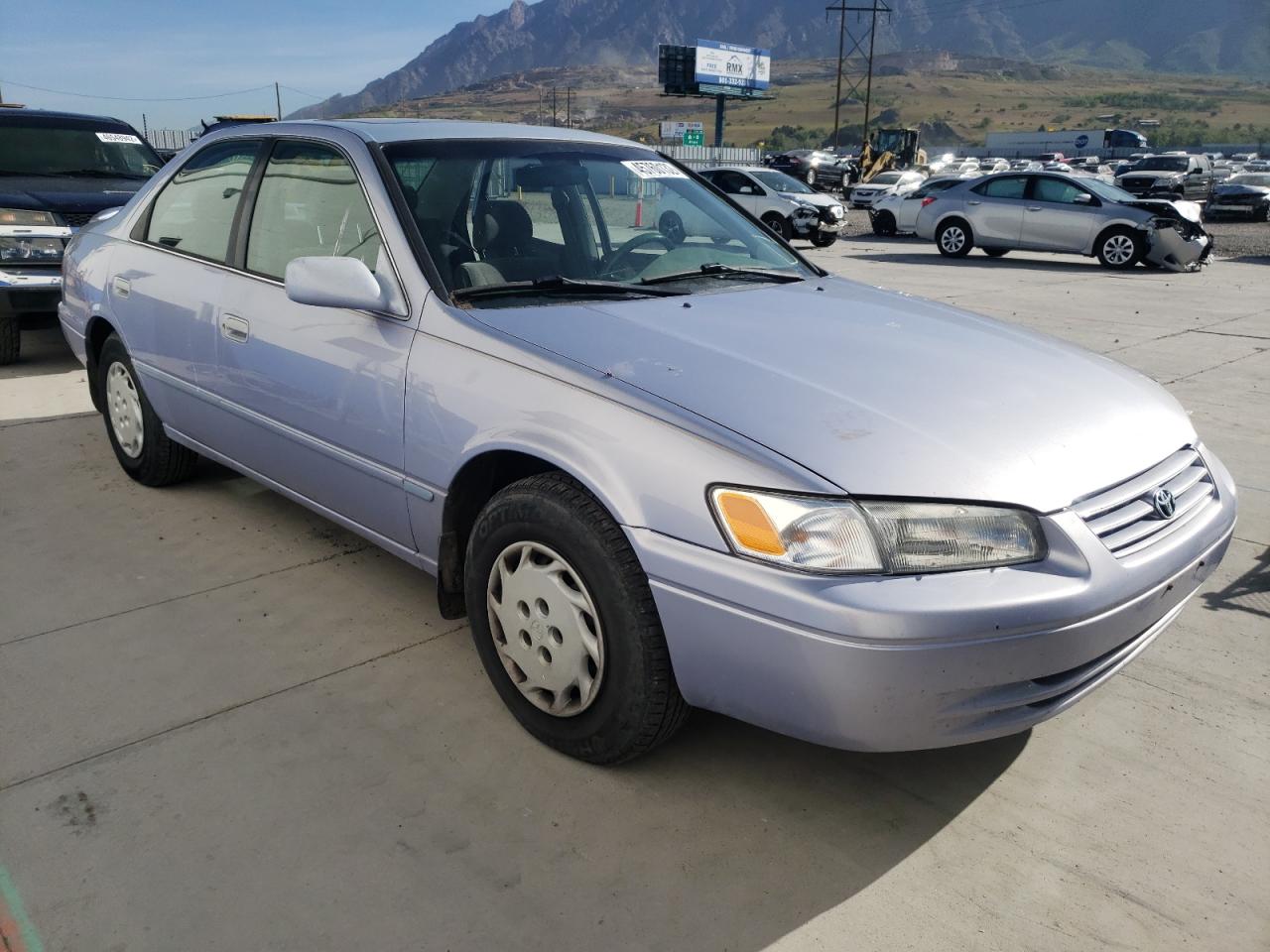 TOYOTA CAMRY CE 1997 with VIN 4T1BG22K9VU021763 - Photo from auction