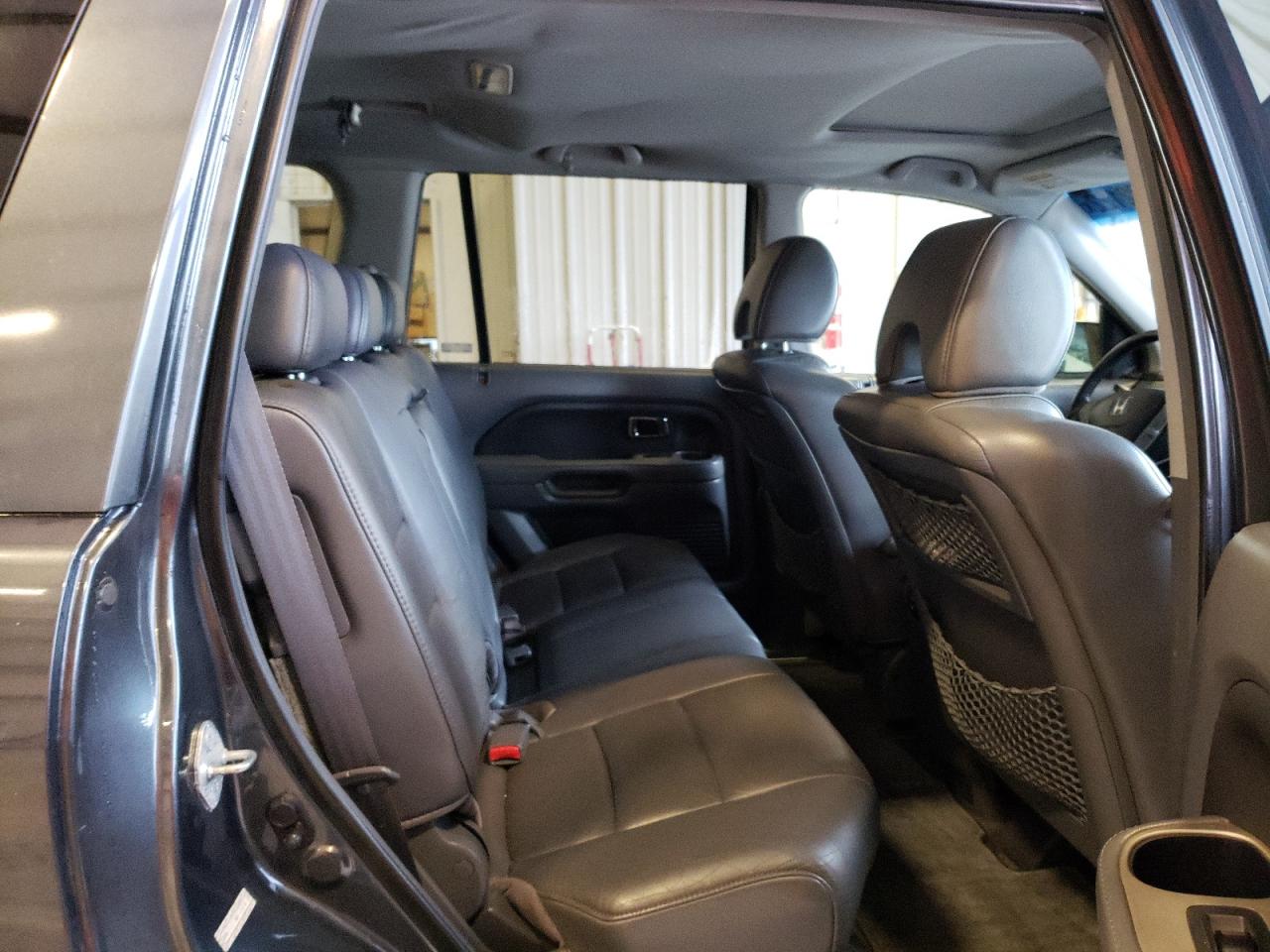 Photo 18 from auction – 2006 HONDA PILOT EX with VIN 2HKYF18756H544031