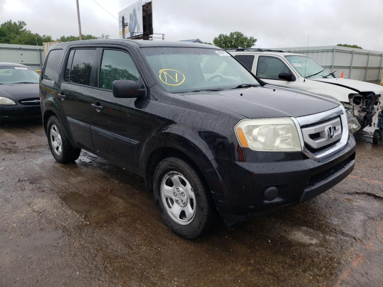 HONDA PILOT LX 2011 with VIN 5FNYF3H27BB007749 - Photo from auction