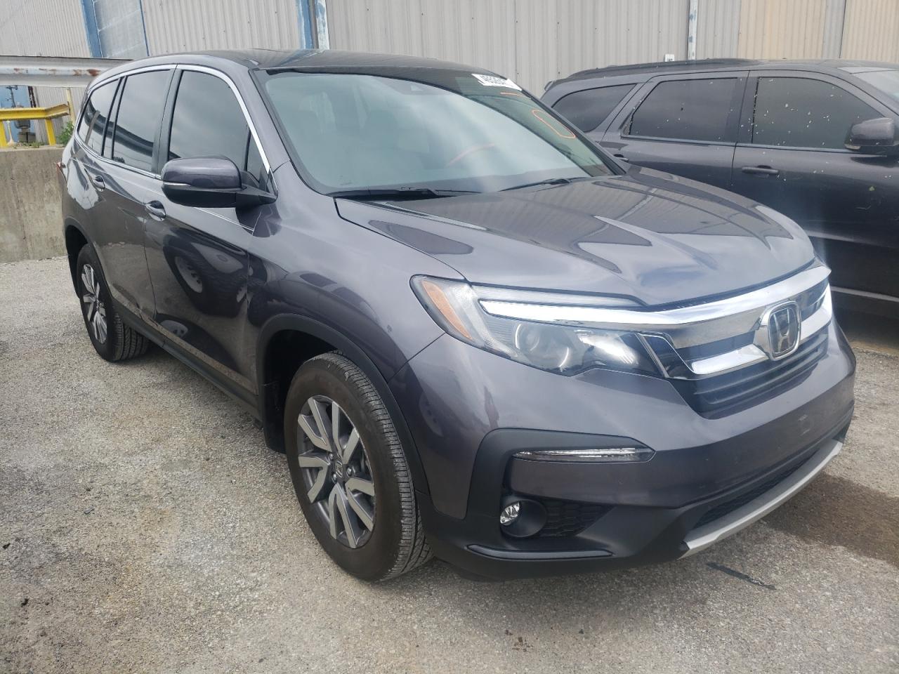 HONDA PILOT EXL 2021 with VIN 5FNYF6H55MB026069 - Photo from auction