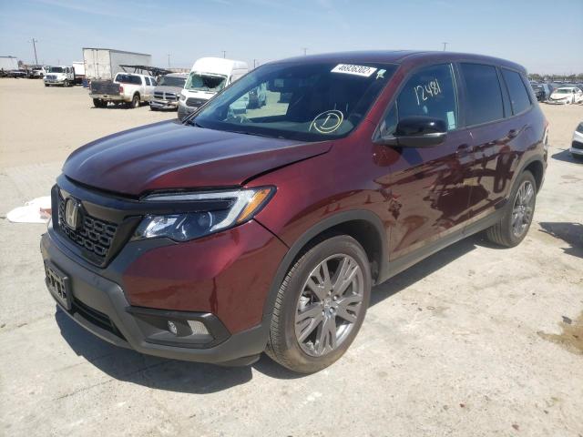 Photo 2 from auction – 2021 HONDA PASSPORT E with VIN 5FNYF7H53MB013570