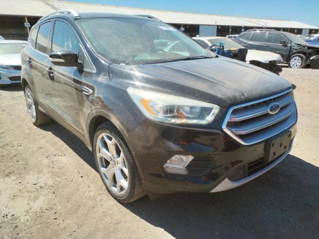 FORD ESCAPE TIT 2017 with VIN 1FMCU0JD4HUB42953 - Photo from auction