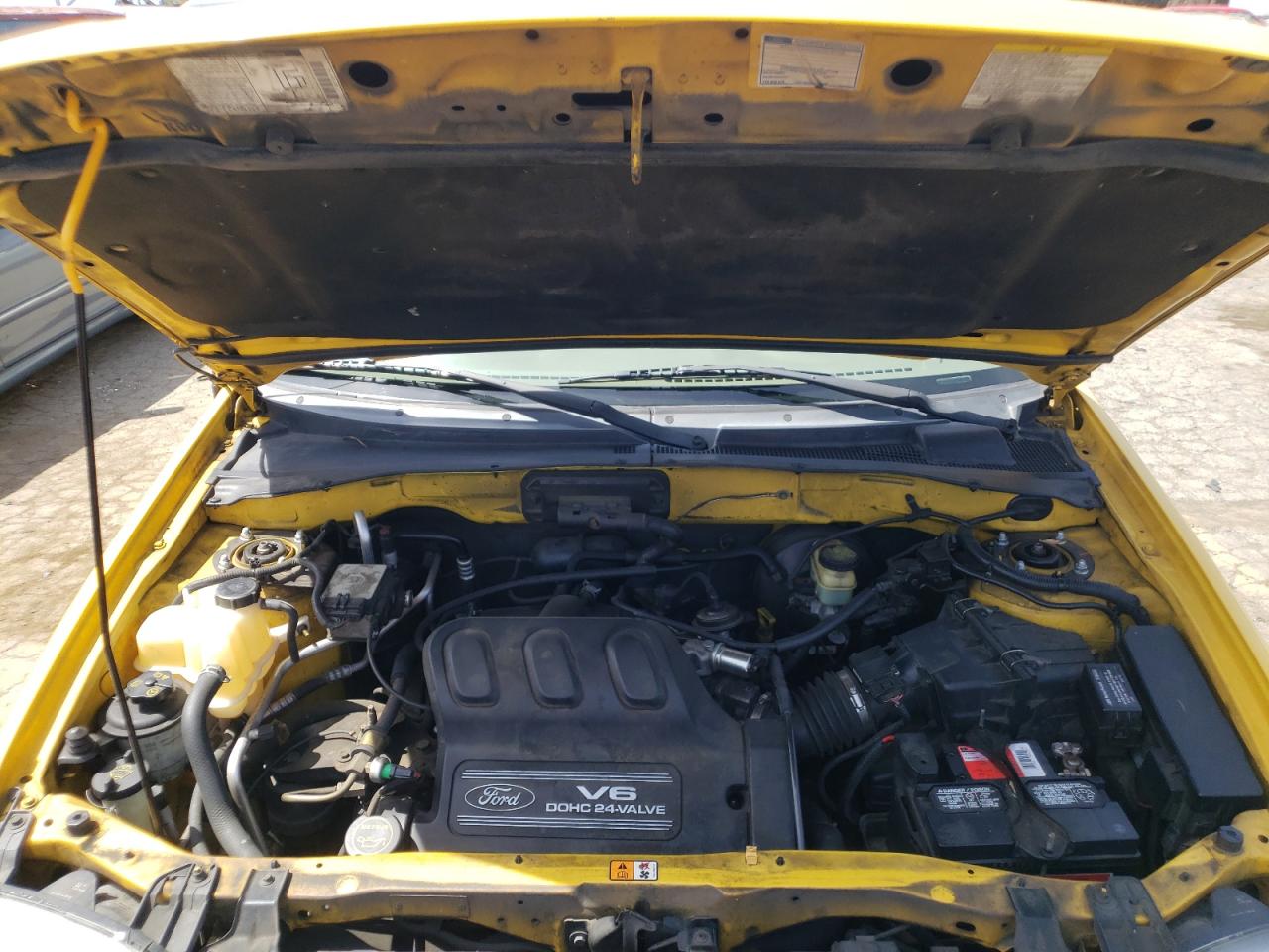 Photo 7 from auction – 2002 FORD ESCAPE XLT with VIN 1FMYU04102KD65310