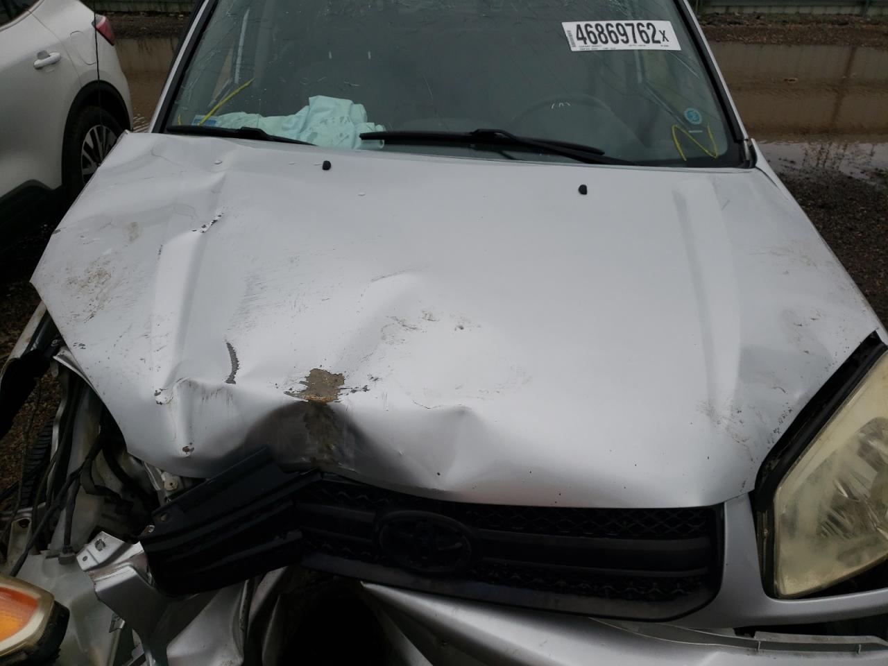 Photo 12 from auction – 2004 TOYOTA RAV4 with VIN JTEGD20V040020065