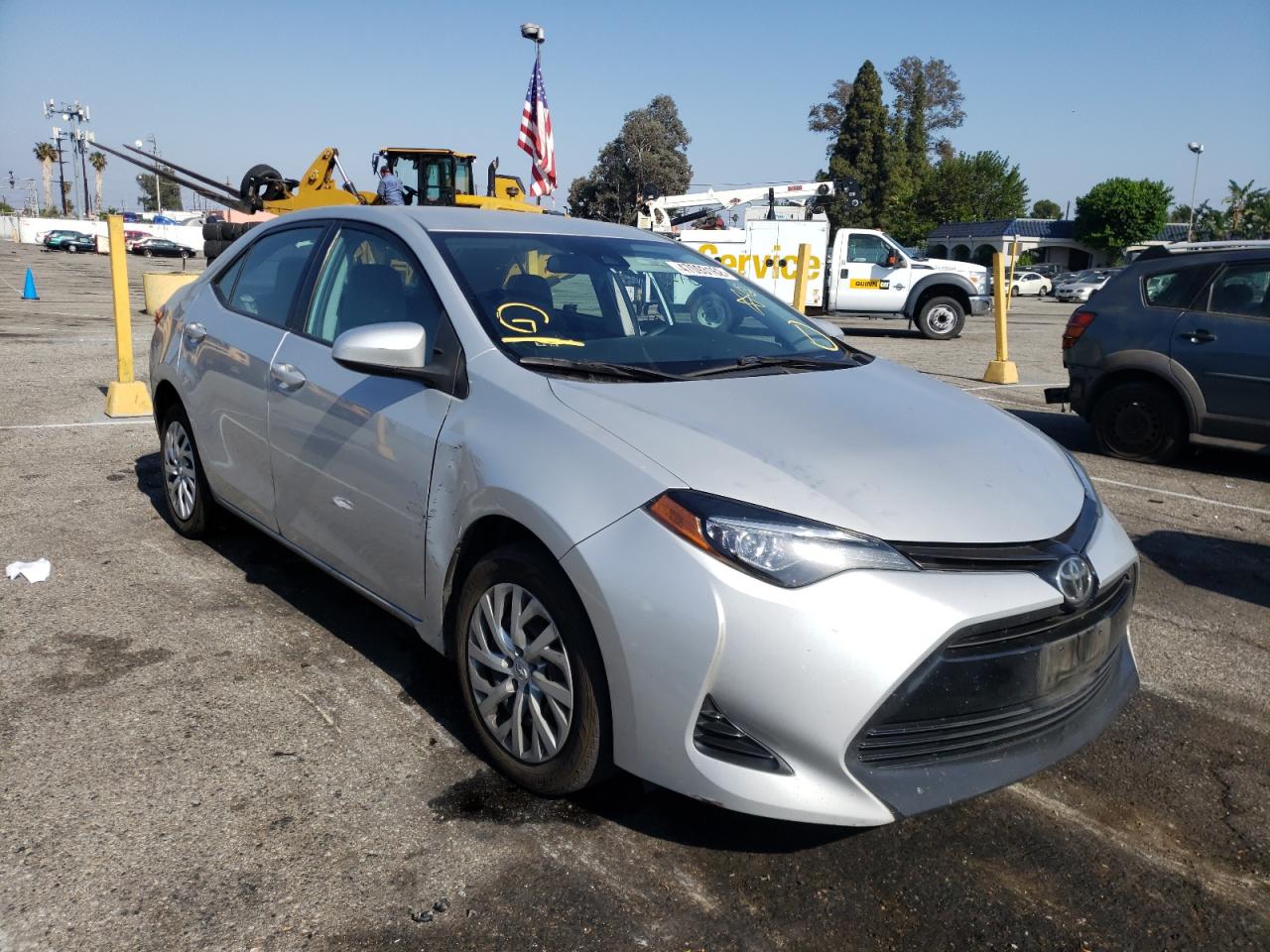 TOYOTA COROLLA L 2017 with VIN 5YFBURHE6HP723967 - Photo from auction