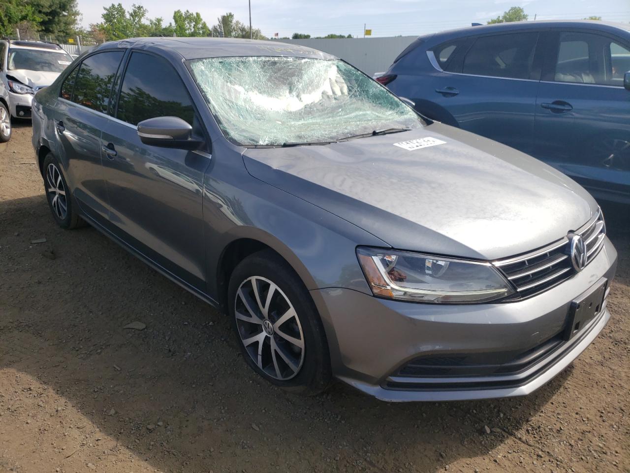 VOLKSWAGEN JETTA SE 2018 with VIN 3VWDB7AJ9JM215710 - Photo from auction