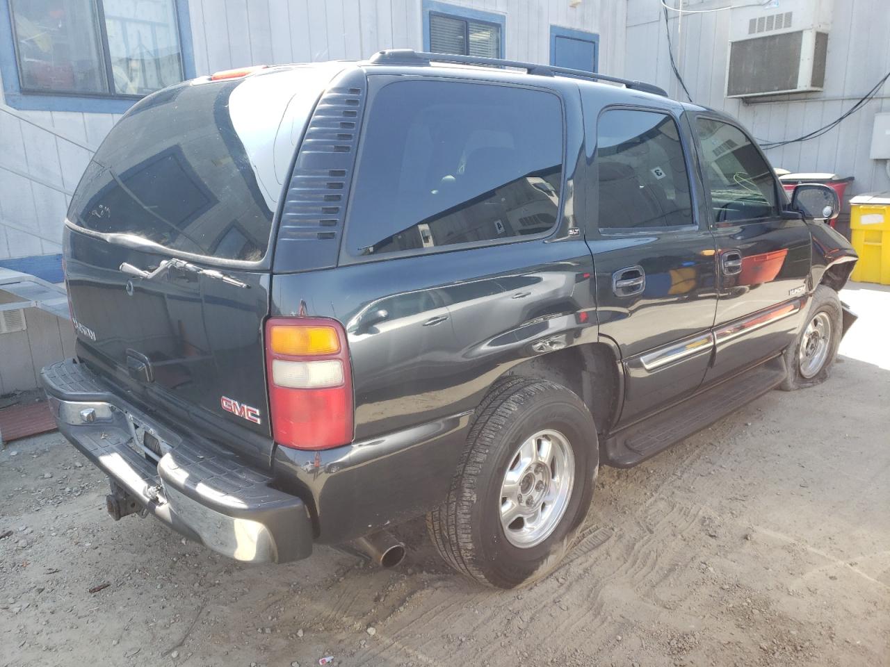 Photo 17 from auction – 2003 GMC YUKON with VIN 1GKEC13T83R149432