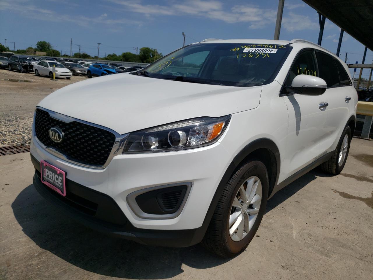 Photo 14 from auction – 2016 KIA SORENTO LX with VIN 5XYPG4A36GG126331